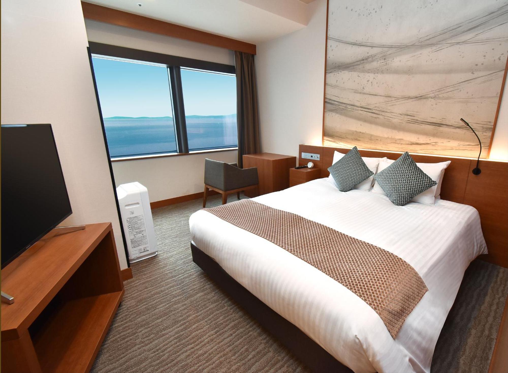 Odysis Suites Osaka Airport Hotel Izumisano Exterior photo